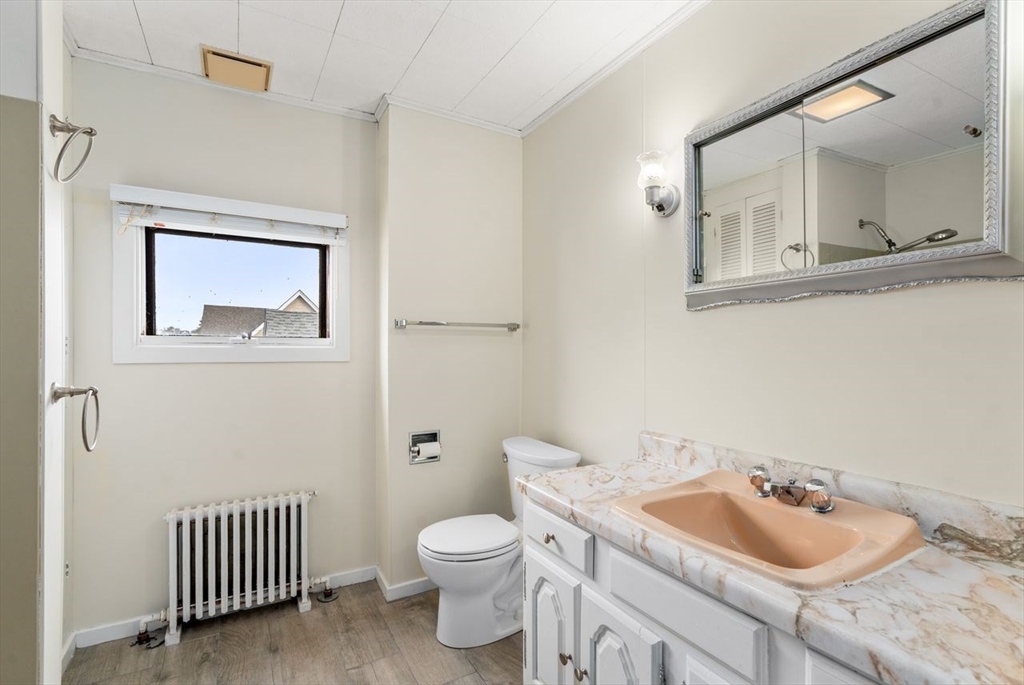 960 Shirley Street Winthrop, MA 02152 - Photo 24 of 38 a bathroom with a sink and a mirror