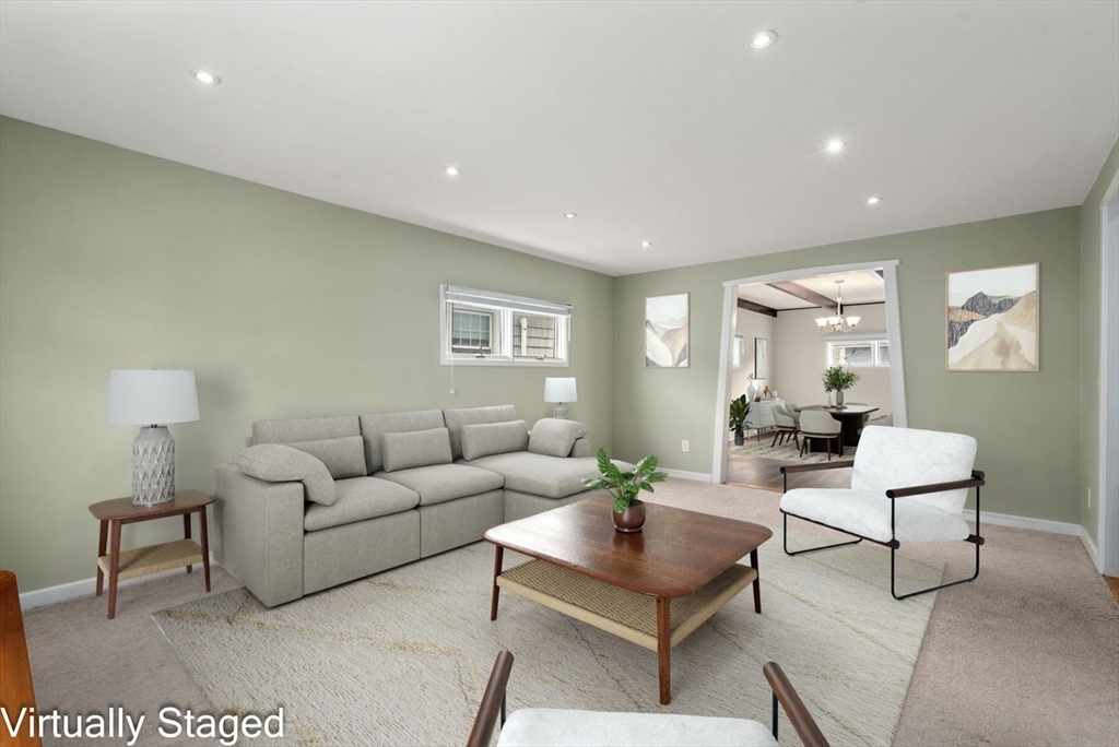960 Shirley Street Winthrop, MA 02152 - Photo 3 of 38 a living room with furniture and a lamp