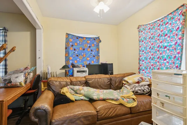 a bedroom with furniture and a couch