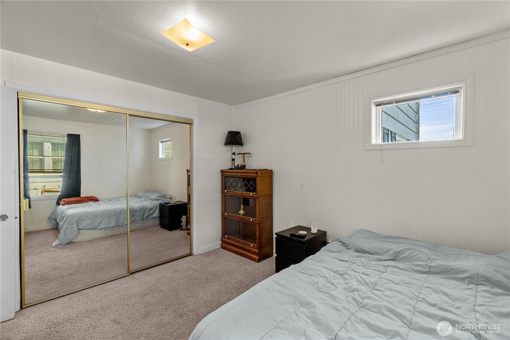522 West 6th Street Aberdeen, WA 98520 - Photo 16 of 39 a bedroom with a bed and furniture