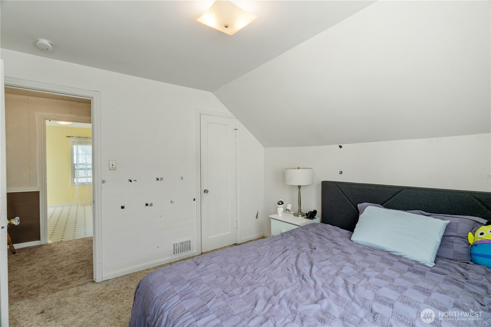 522 West 6th Street Aberdeen, WA 98520 - Photo 24 of 39 a view of a bedroom with a bed and closet