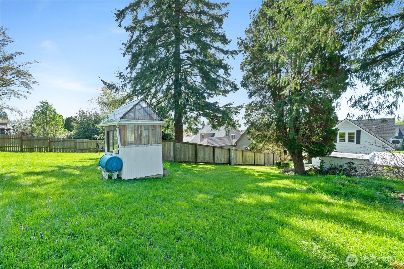 522 West 6th Street Aberdeen, WA 98520 - Photo 32 of 39 a view of a house with backyard and a tree