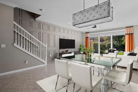 a view of a livingroom with furniture window and a fireplace