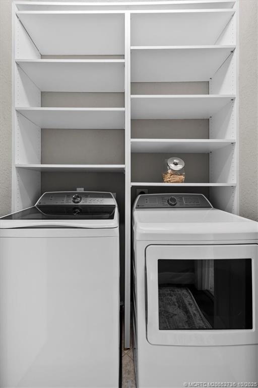 692 Southwest Glen Crest Way Stuart, FL 34997 - Photo 20 of 38 a close up view of washer and dryer