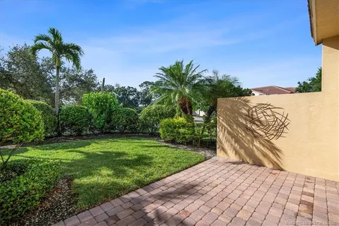 a aerial view of a house with a yard