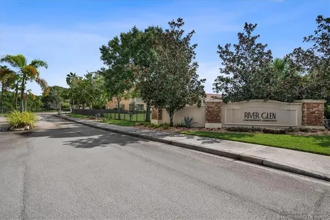 a view of a swimming pool with lounge chair