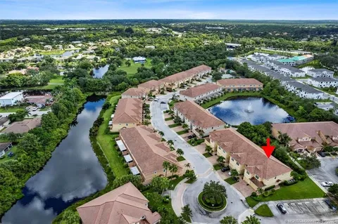an aerial view of a house with a garden