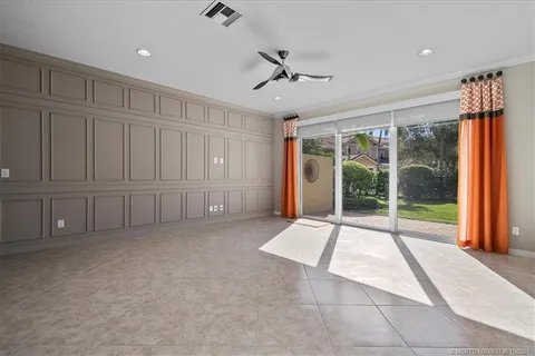 a view of an empty room with a sliding door