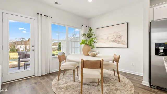 a view of a livingroom with furniture and window