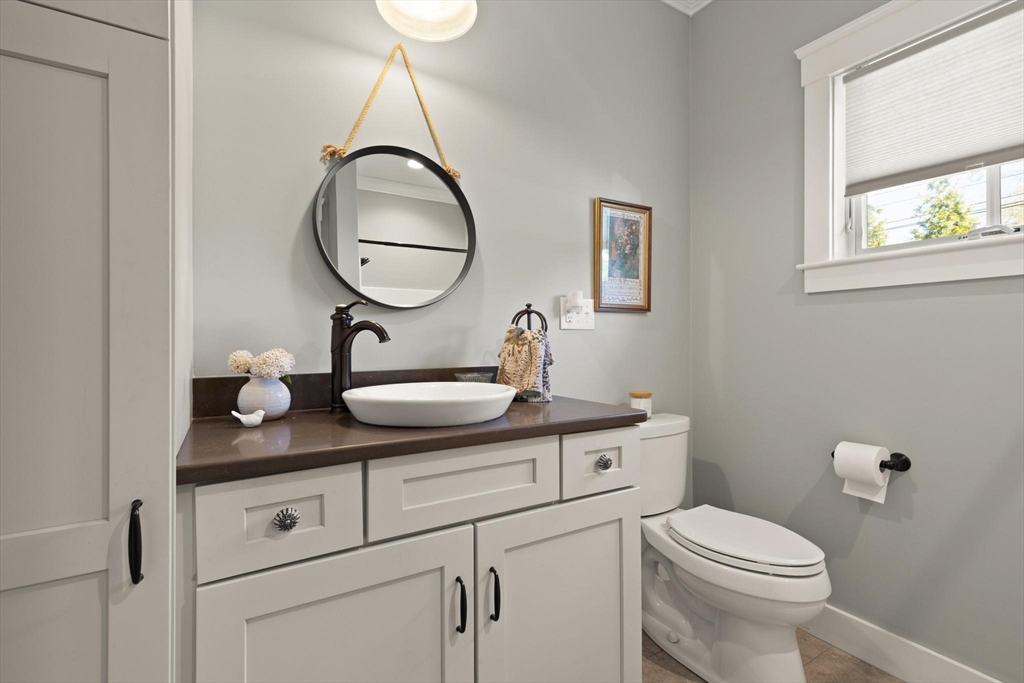 14 Parkview Road, Unit 14 Franklin, MA 02038 - Photo 19 of 42 a bathroom with a toilet a sink and a mirror