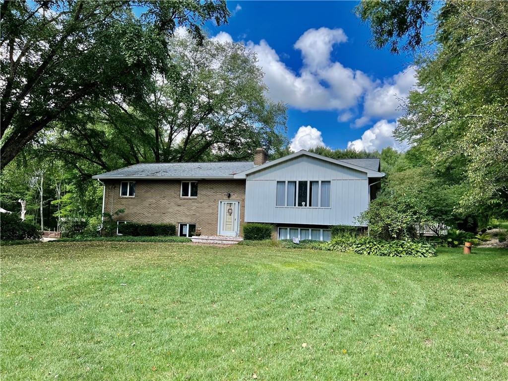 672 New Castle Road Slippery Rock, PA 16057 - Photo 1 of 9 a view of a house with a yard