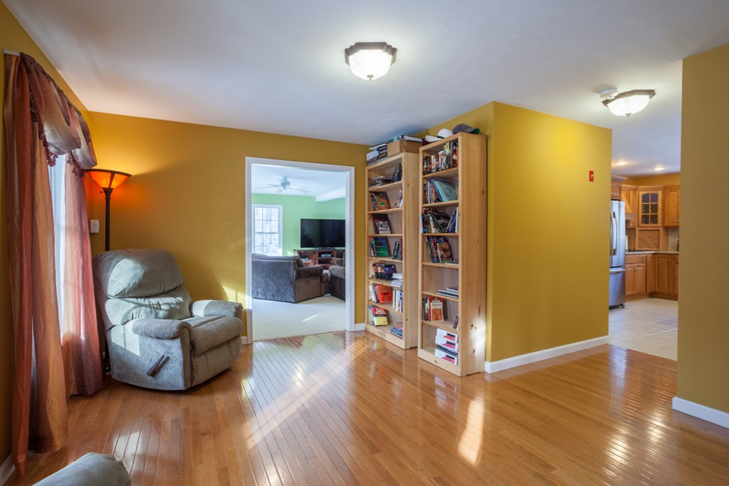 152 Old Worcester Road Charlton, MA 01507 - Photo 11 of 28 a living room with furniture and a walk in closet