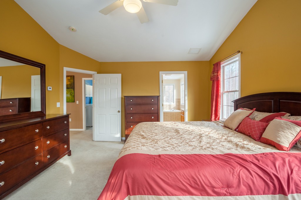 152 Old Worcester Road Charlton, MA 01507 - Photo 15 of 28 a bedroom with a bed and a dresser