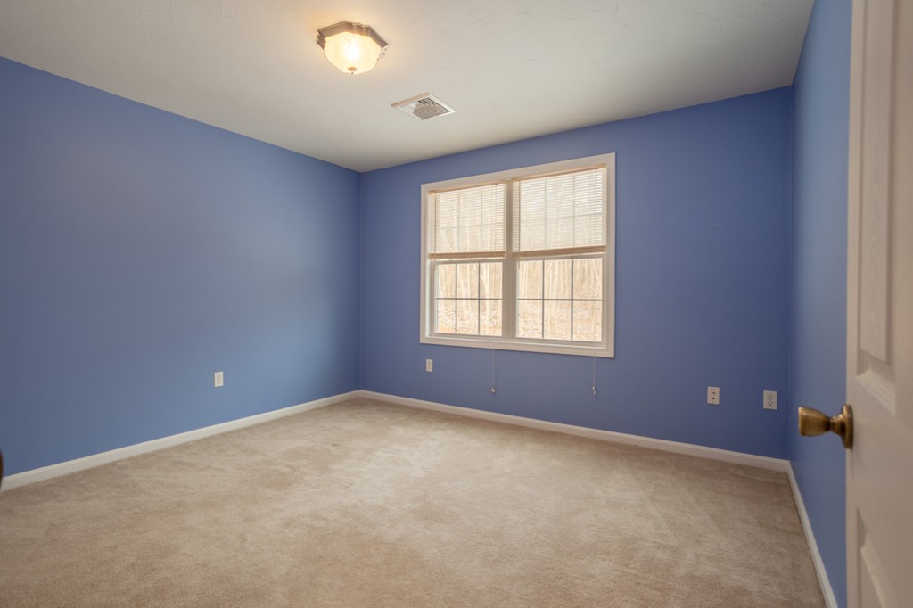 152 Old Worcester Road Charlton, MA 01507 - Photo 23 of 28 a view of an empty room with a window