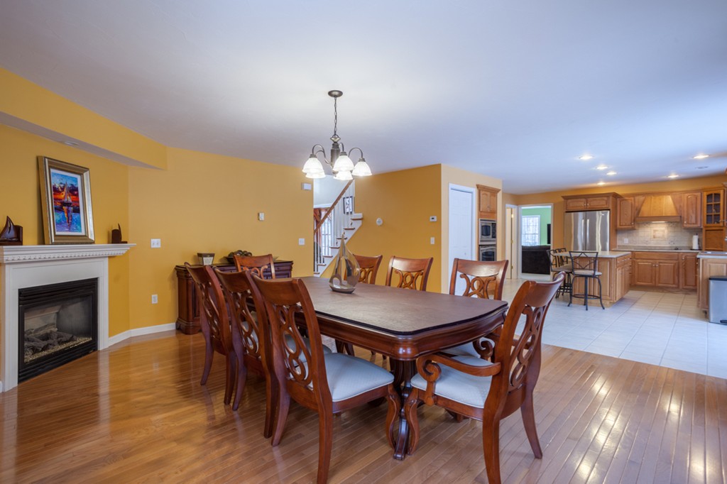 152 Old Worcester Road Charlton, MA 01507 - Photo 6 of 28 a view of a dining room with furniture wooden floor and chandelier