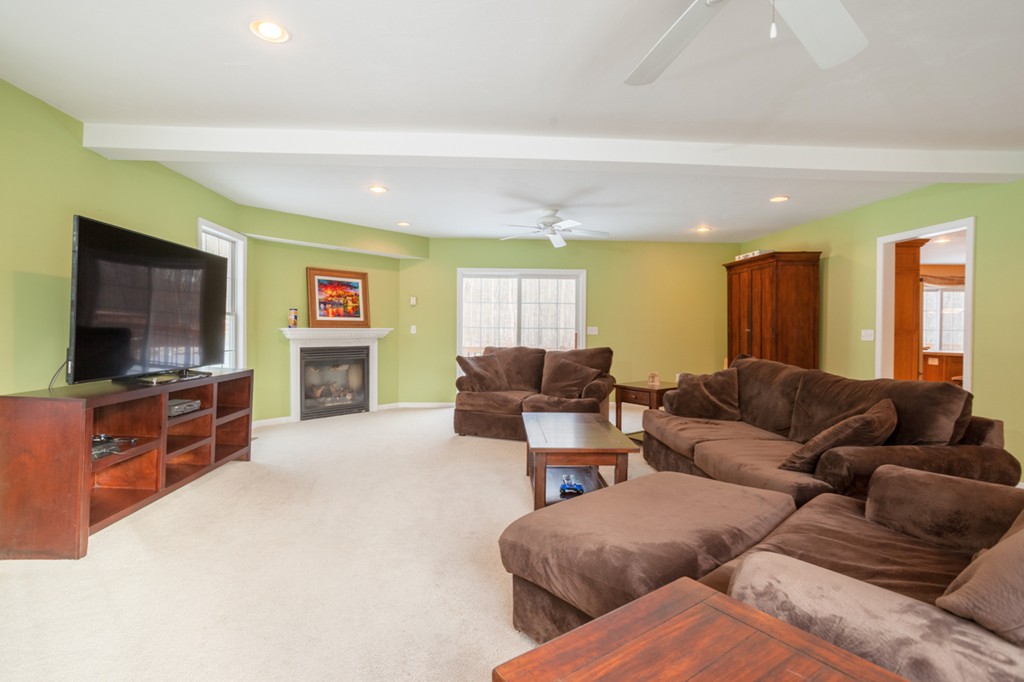 152 Old Worcester Road Charlton, MA 01507 - Photo 8 of 28 a living room with furniture and a flat screen tv