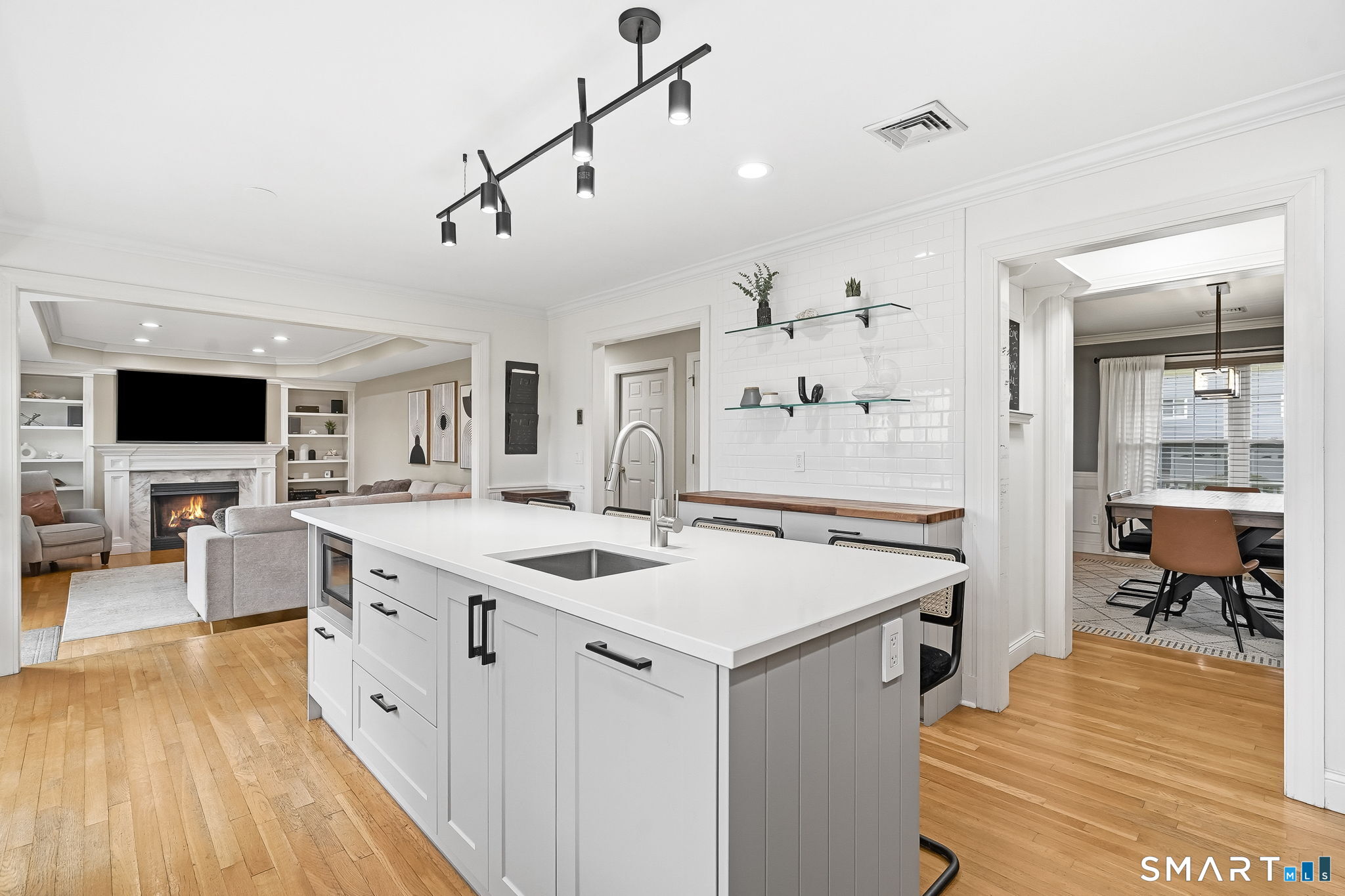 80 3rd Avenue Stratford, CT 06615 - Photo 9 of 40 a open kitchen with stainless steel appliances granite countertop a sink stove and wooden floor