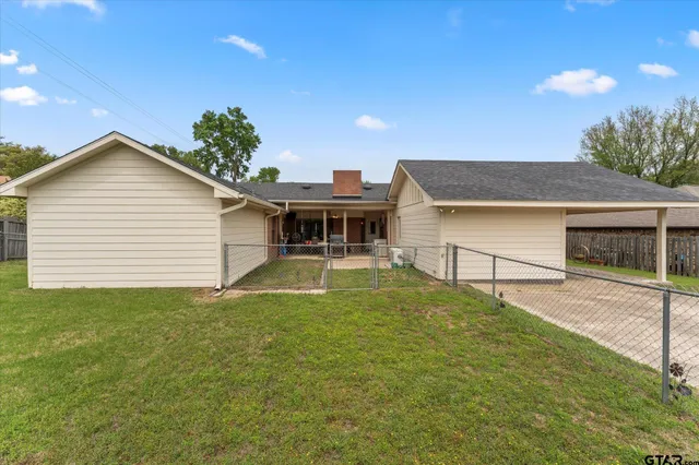a house view with a garden space