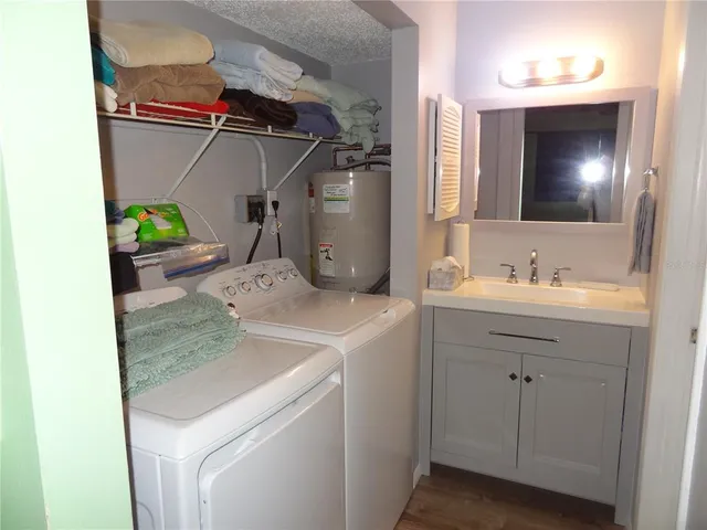 a bathroom with a sink and mirror