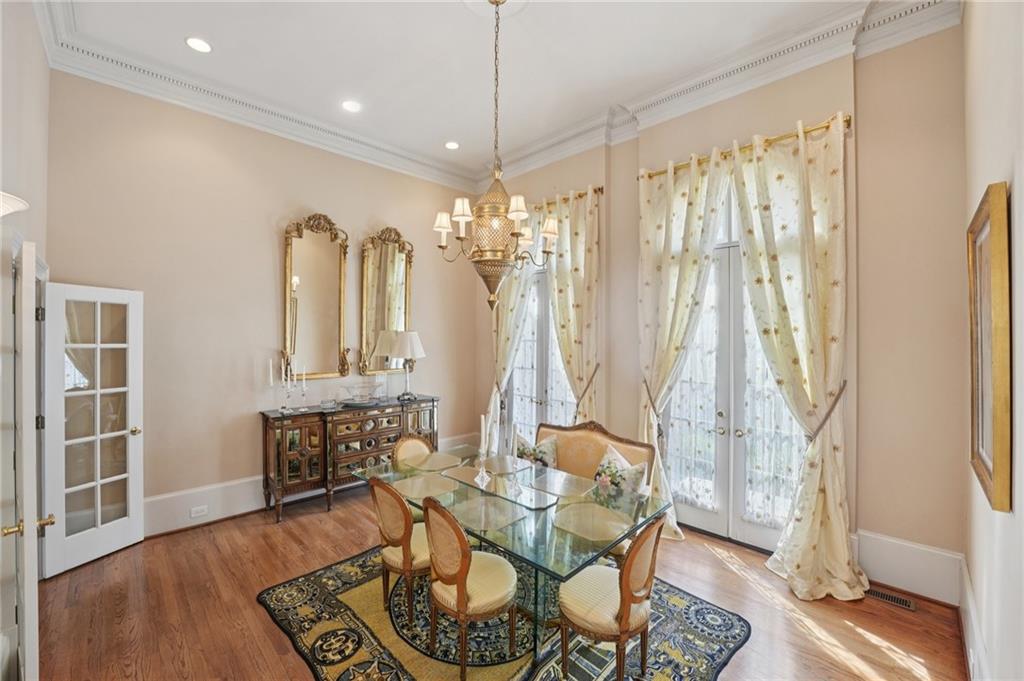 1296 Niskey Lake Road Southwest Atlanta, GA 30331 - Photo 13 of 88 a living room with furniture a table and a chandelier