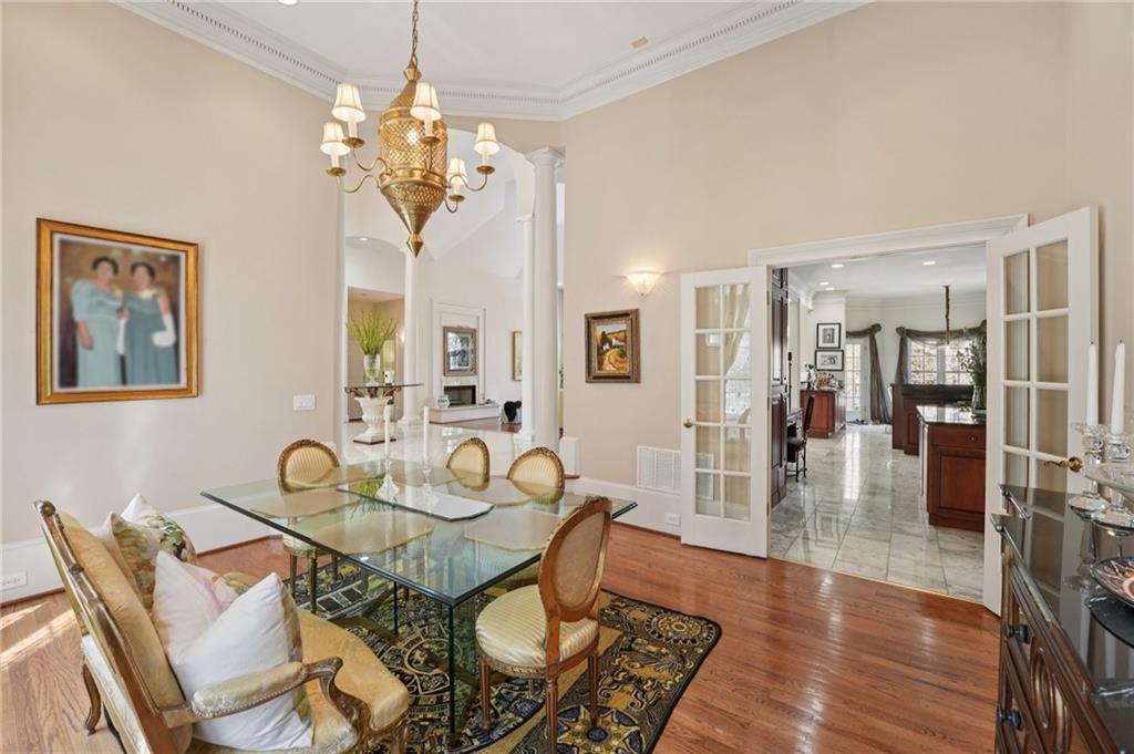 1296 Niskey Lake Road Southwest Atlanta, GA 30331 - Photo 15 of 88 a view of a dining room with furniture and chandelier