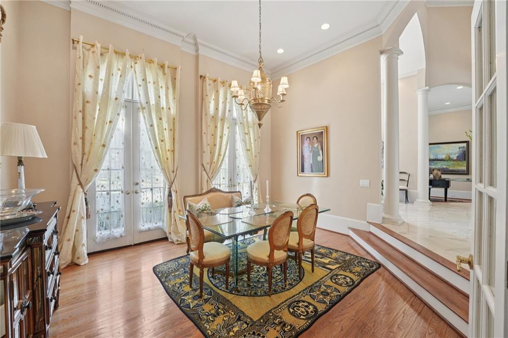 1296 Niskey Lake Road Southwest Atlanta, GA 30331 - Photo 16 of 88 a living room with furniture and a chandelier