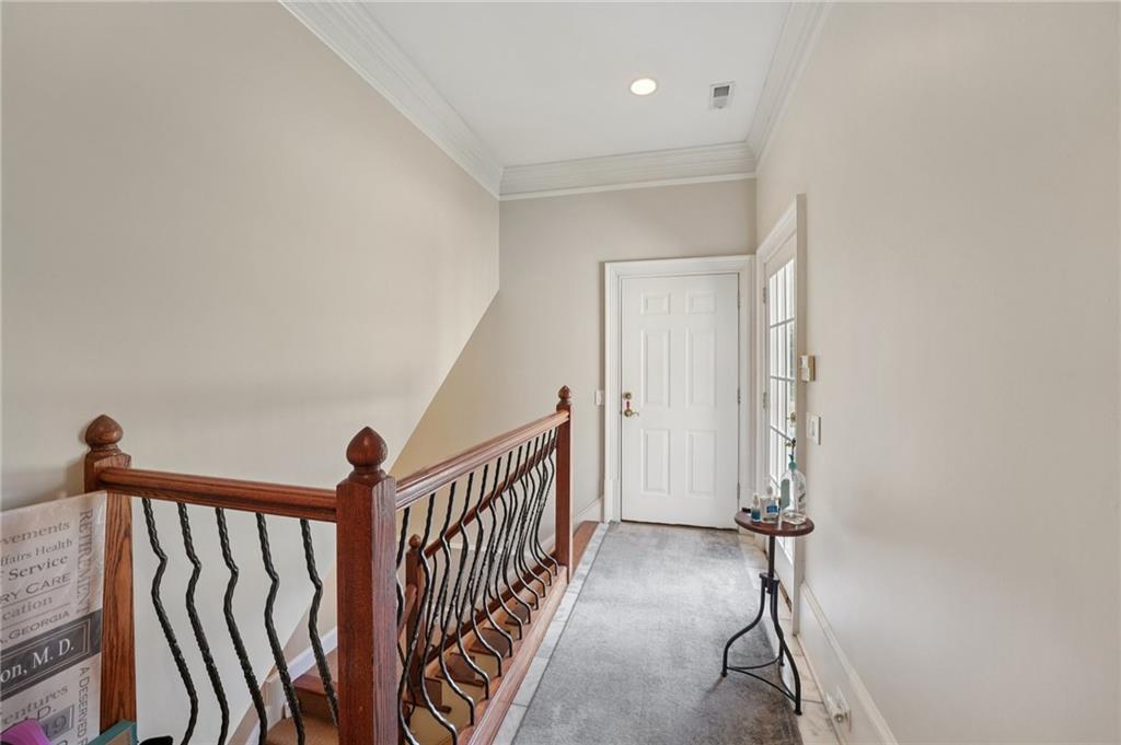 1296 Niskey Lake Road Southwest Atlanta, GA 30331 - Photo 32 of 88 a view of a hallway with a window