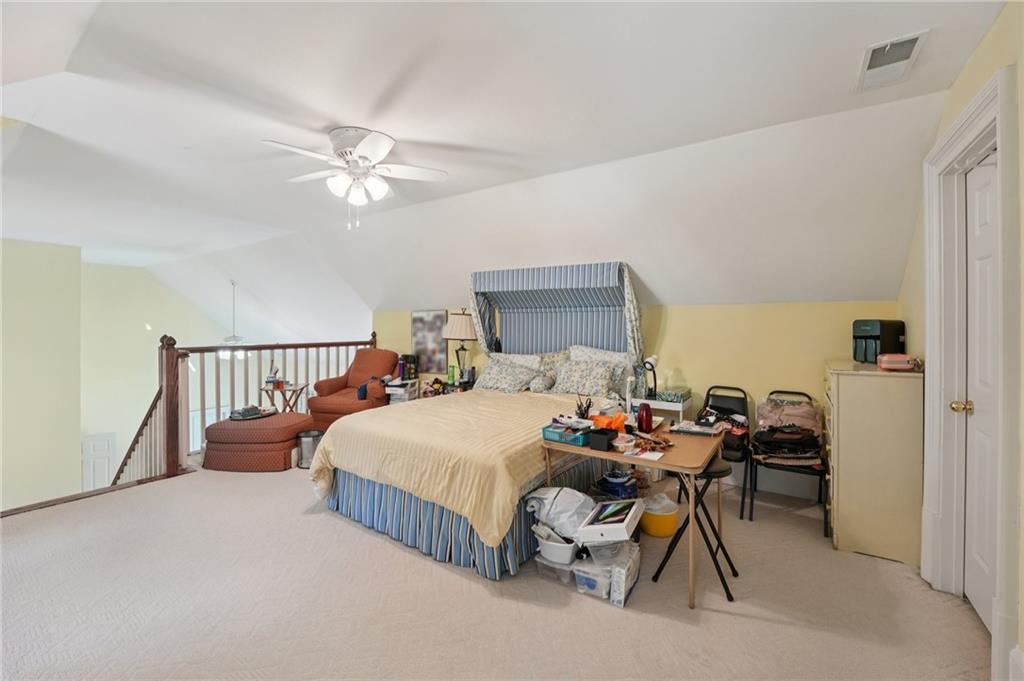 1296 Niskey Lake Road Southwest Atlanta, GA 30331 - Photo 44 of 88 a bed room with a bed and a chair