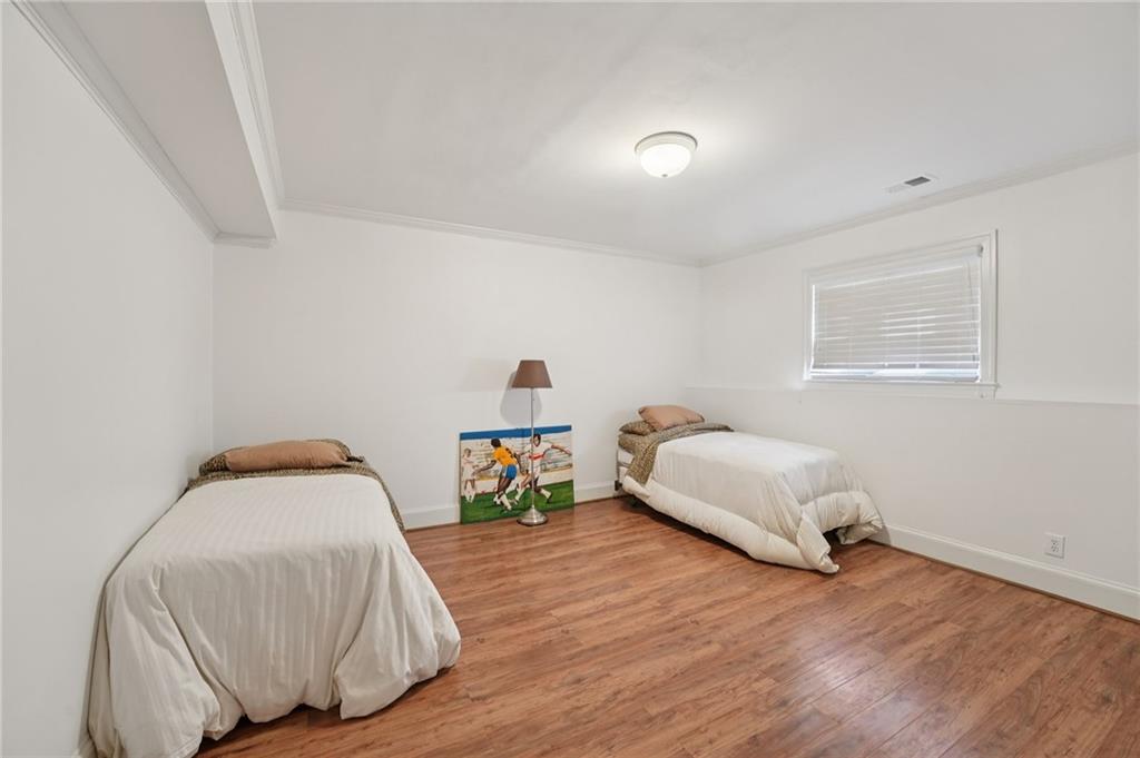 1296 Niskey Lake Road Southwest Atlanta, GA 30331 - Photo 49 of 88 a bedroom with a bed and a window