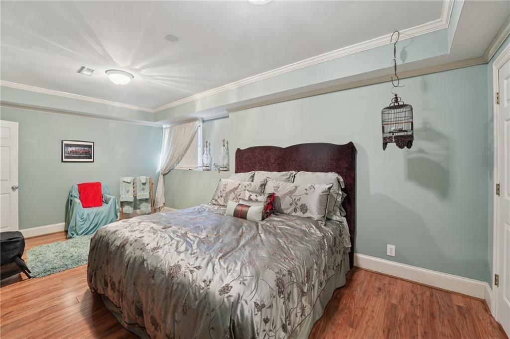 1296 Niskey Lake Road Southwest Atlanta, GA 30331 - Photo 52 of 88 a bedroom with a bed and a closet