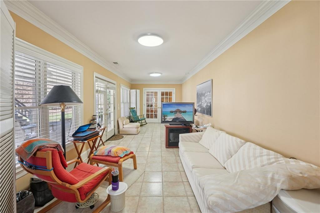 1296 Niskey Lake Road Southwest Atlanta, GA 30331 - Photo 59 of 88 a living room with furniture kitchen view and a large window