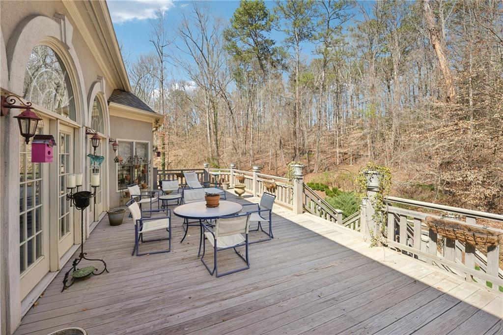 1296 Niskey Lake Road Southwest Atlanta, GA 30331 - Photo 67 of 88 a dining room with furniture and wooden floor