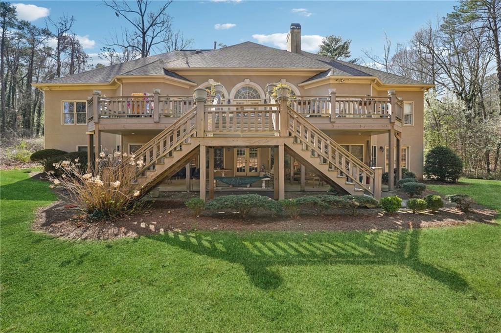 1296 Niskey Lake Road Southwest Atlanta, GA 30331 - Photo 72 of 88 a view of a big yard next to a house