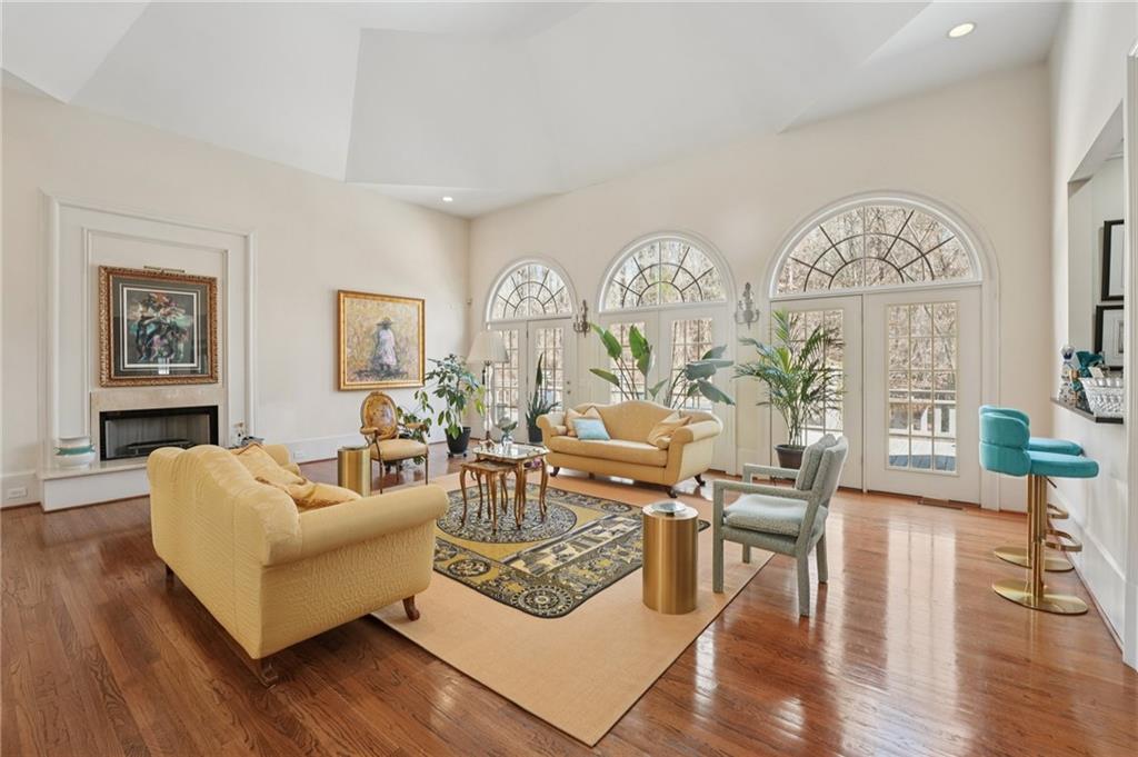 1296 Niskey Lake Road Southwest Atlanta, GA 30331 - Photo 8 of 88 a living room with fireplace furniture and wooden floor
