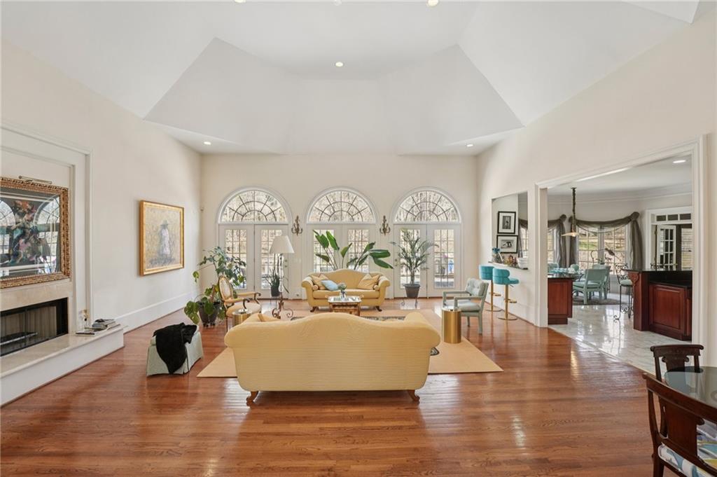 1296 Niskey Lake Road Southwest Atlanta, GA 30331 - Photo 10 of 88 a living room with fireplace furniture and a flat screen tv