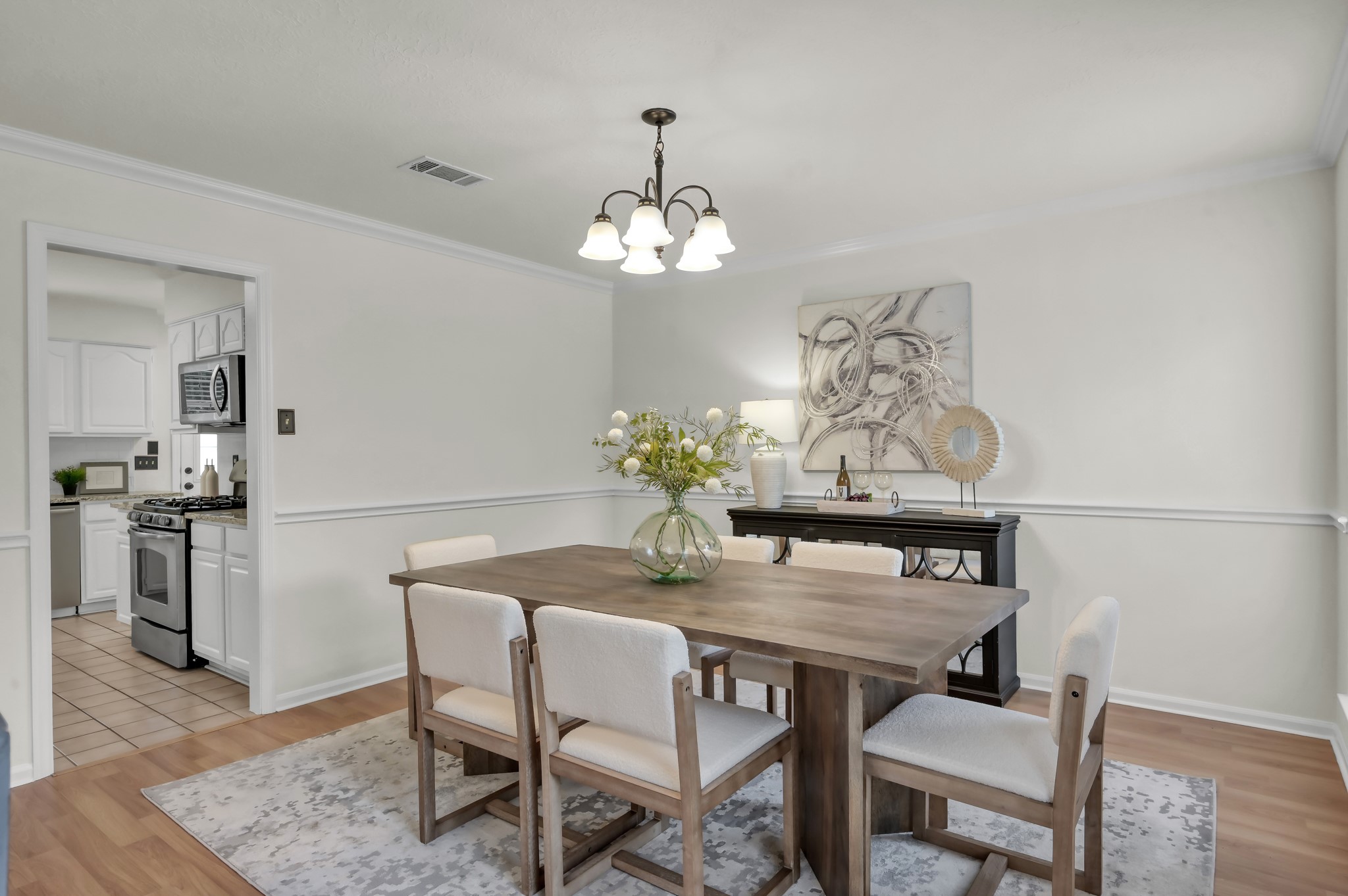 114 Regency Way Conroe, TX 77304 - Photo 8 of 48 Formal dining with crown molding and chair rail feature. Easy access to kitchen.