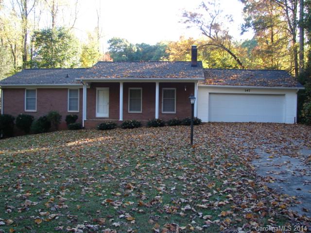 147 Ashbrook Rd Point, Unit 27 Statesville, NC 28677 - Photo 1 of 24 a front view of a house with a garden