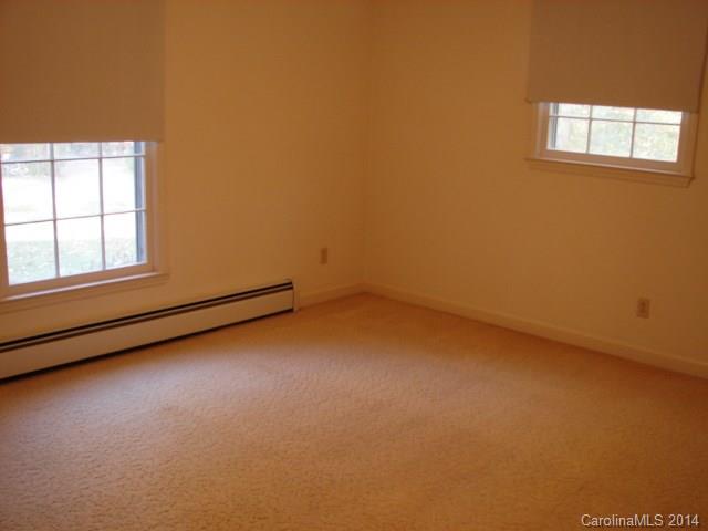 147 Ashbrook Rd Point, Unit 27 Statesville, NC 28677 - Photo 11 of 24 an empty room with a window