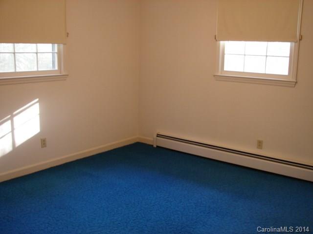 147 Ashbrook Rd Point, Unit 27 Statesville, NC 28677 - Photo 12 of 24 an empty room with a window