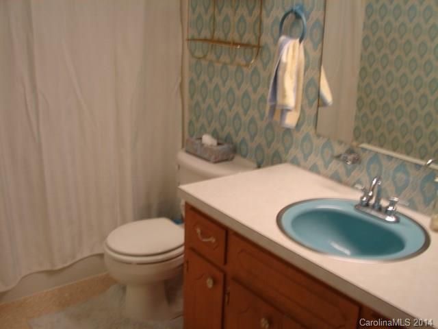 147 Ashbrook Rd Point, Unit 27 Statesville, NC 28677 - Photo 14 of 24 a bathroom with a sink and a toilet