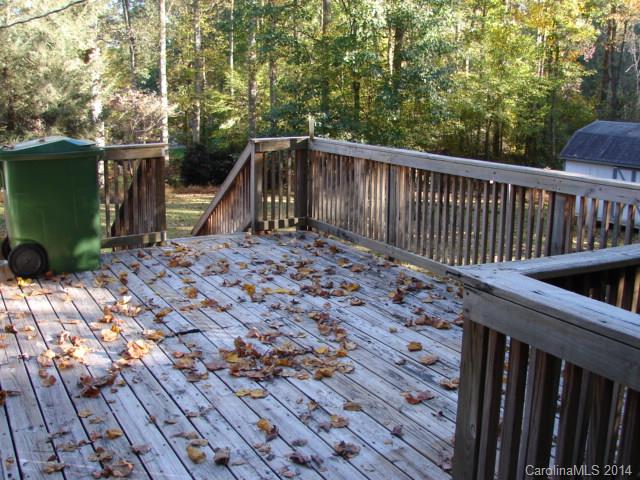 147 Ashbrook Rd Point, Unit 27 Statesville, NC 28677 - Photo 3 of 24 a view of a wooden floor with a dry yard