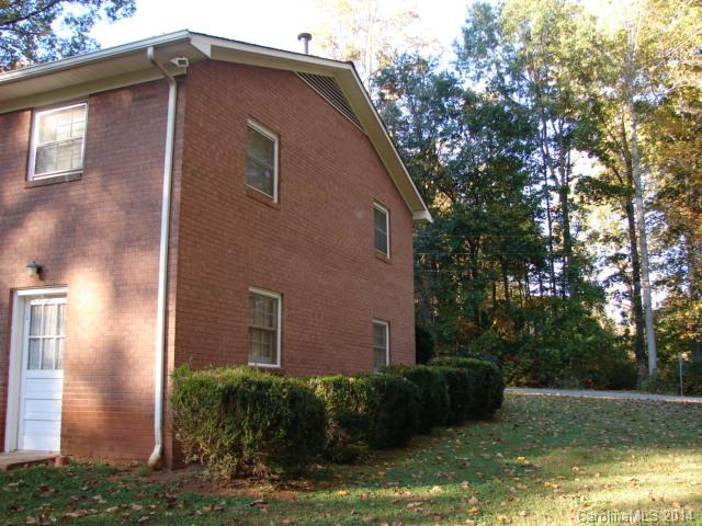 147 Ashbrook Rd Point, Unit 27 Statesville, NC 28677 - Photo 7 of 24 a backyard of a house with lots of green space