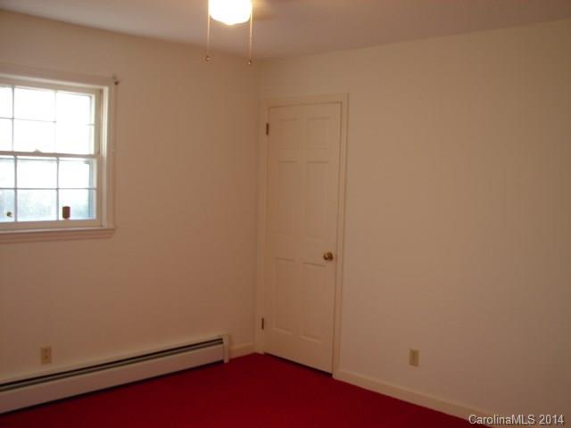 147 Ashbrook Rd Point, Unit 27 Statesville, NC 28677 - Photo 10 of 24 an empty room with a window
