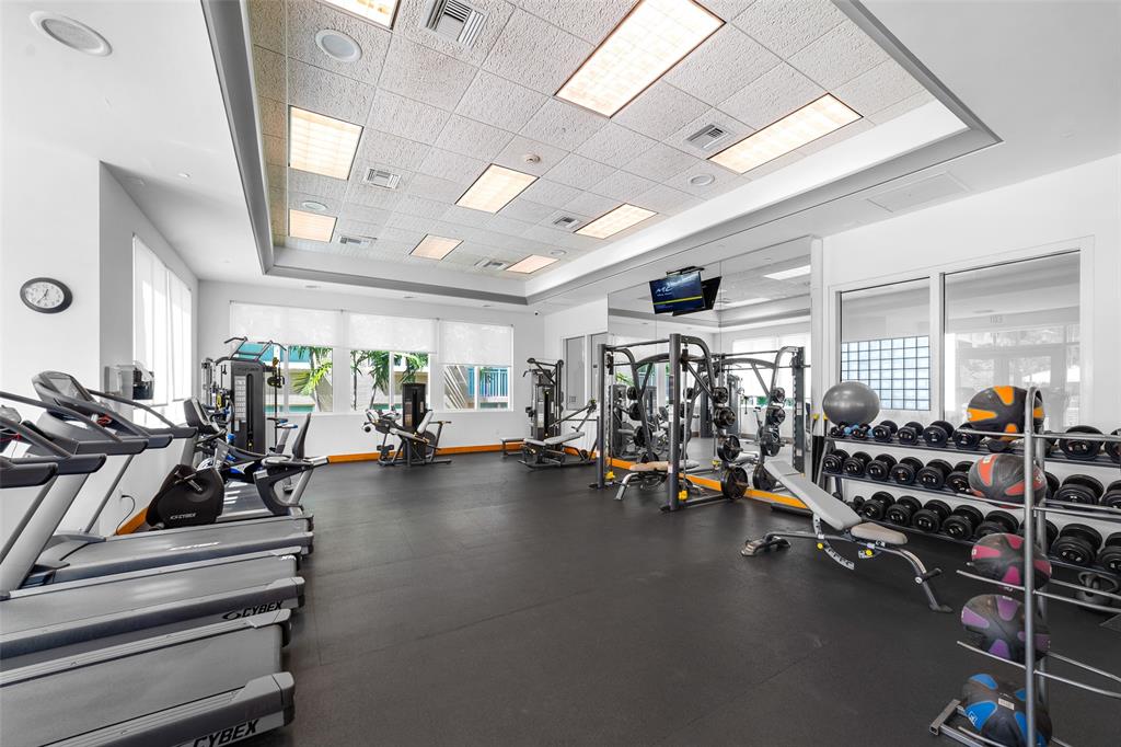 99 Southeast Mizner Boulevard, Unit 603 Boca Raton, FL 33432 - Photo 30 of 34 a view of a room with gym equipment