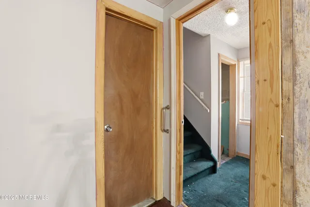 a view of hallway with stairs