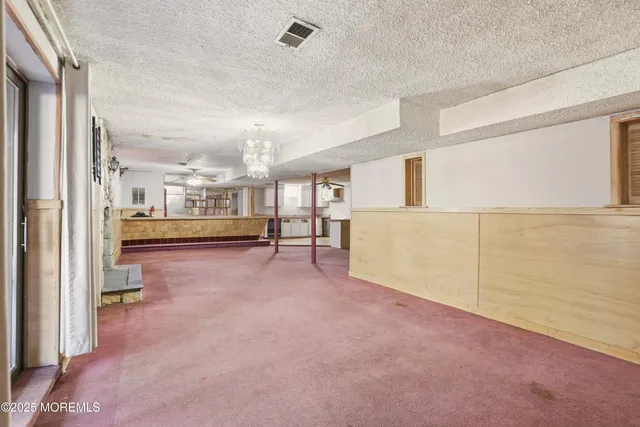 a view of a livingroom with furniture