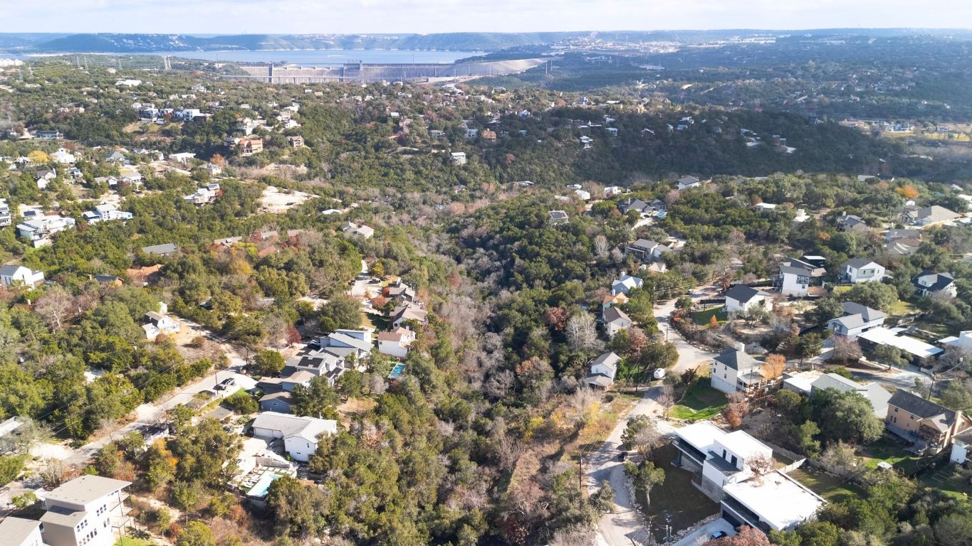 14504 Hunters Pass Austin, TX 78734 - Photo 6 of 19 an aerial view of residential houses with city view