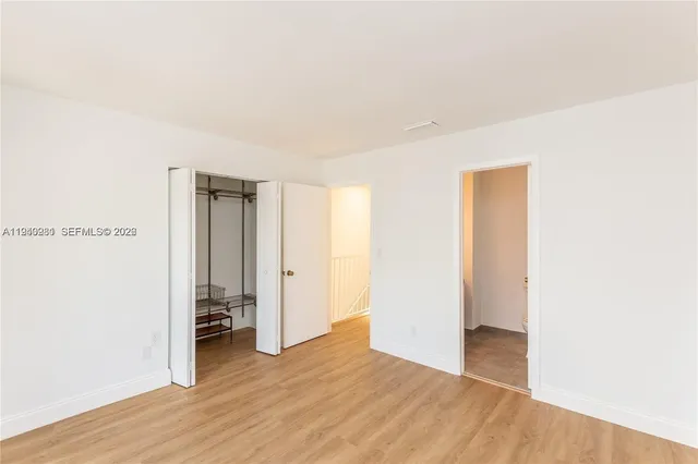 a bathroom with a shower curtain and a shower curtain