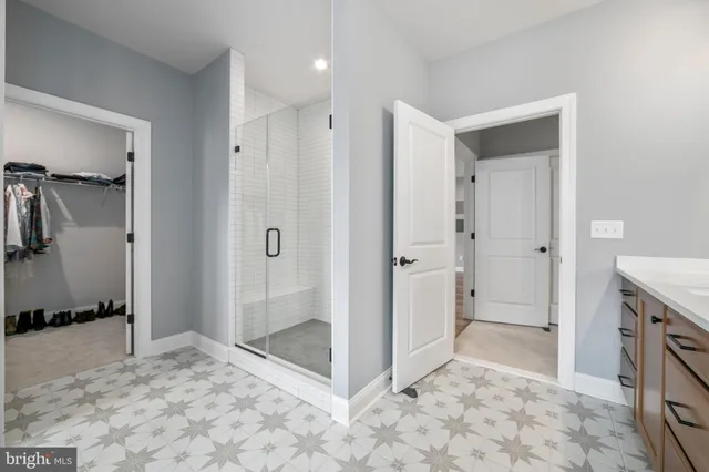 a view of a bathroom with shower