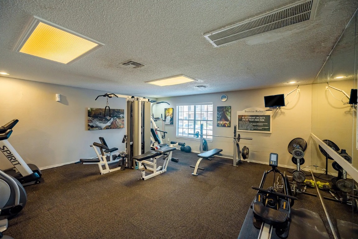 2809 West William Cannon Drive, Unit I101 Austin, TX 78745 - Photo 26 of 29 a view of a room with gym equipment